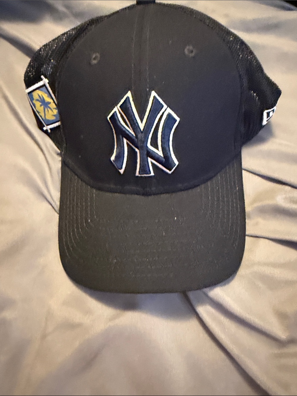 New Era Black NY Trucker Hat
